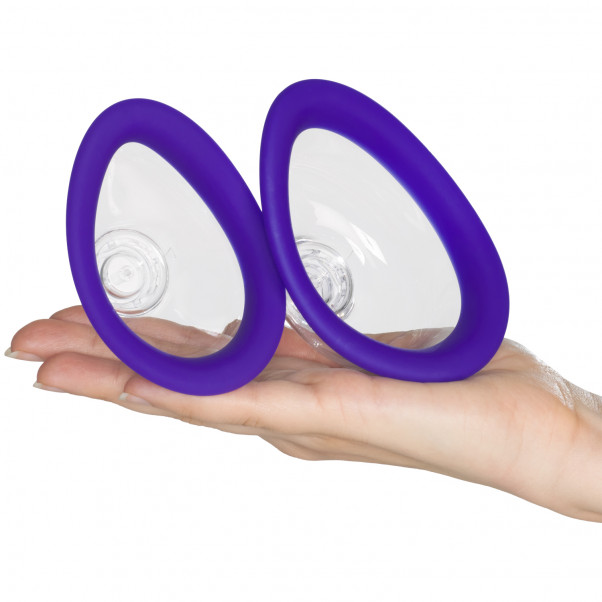 Doc Johnson Bloom Rechargeable Intimate Body Pump Set product held in hand 51