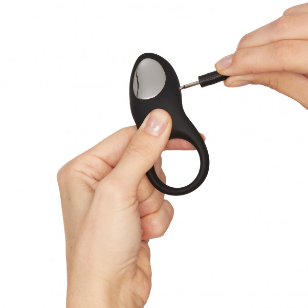 Sinful Love Buzz Rechargeable Remote Control Cock Ring product held in hand 51