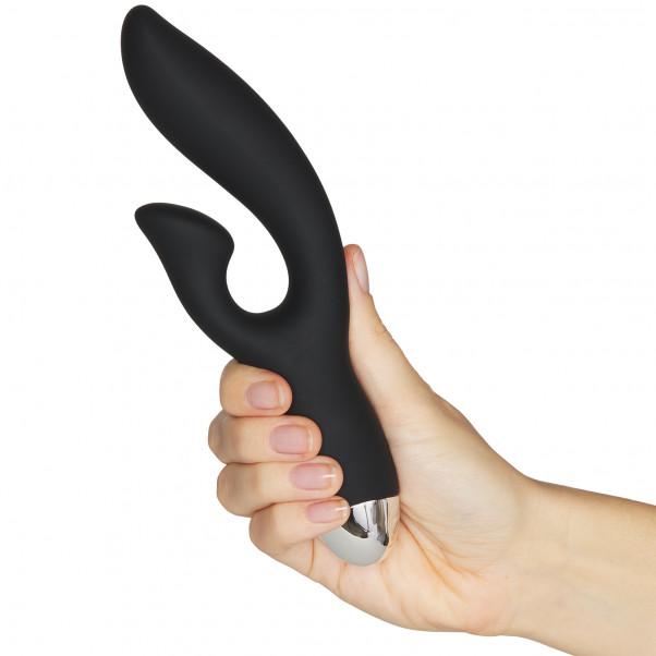 Sinful Curve Rechargeable Rabbit Vibrator product held in hand 50