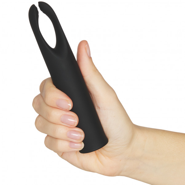 Sinful Teaser Rechargeable Clitoral Vibrator product held in hand 50