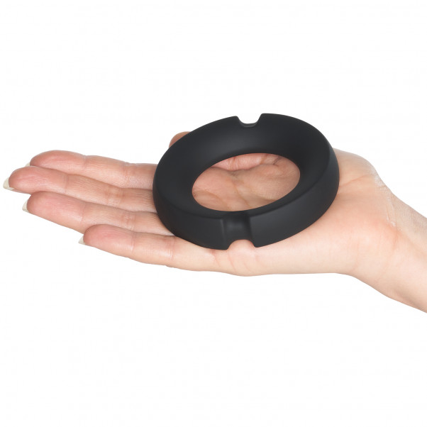 NEW KINK Metal Penisring product held in hand 50