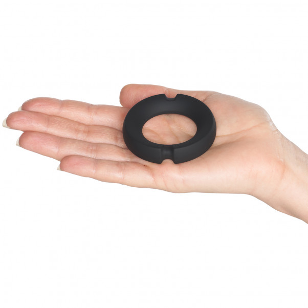 NEW KINK Metal Penisring product held in hand 52