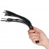 Fifty Shades of Grey Bound to You Flogger 29 cm product held in hand 50